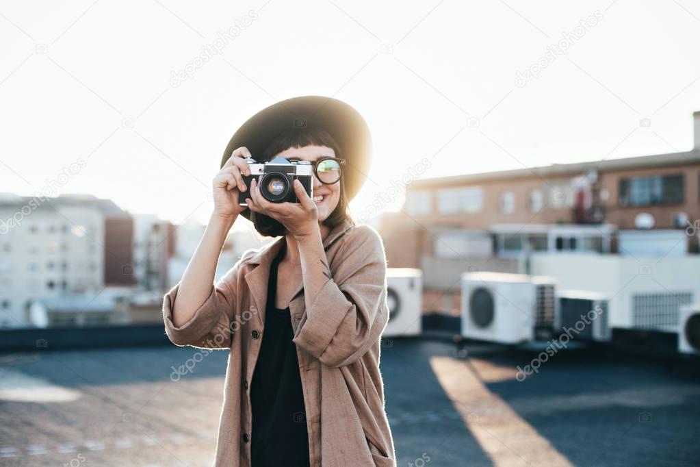 hipster woman with camera