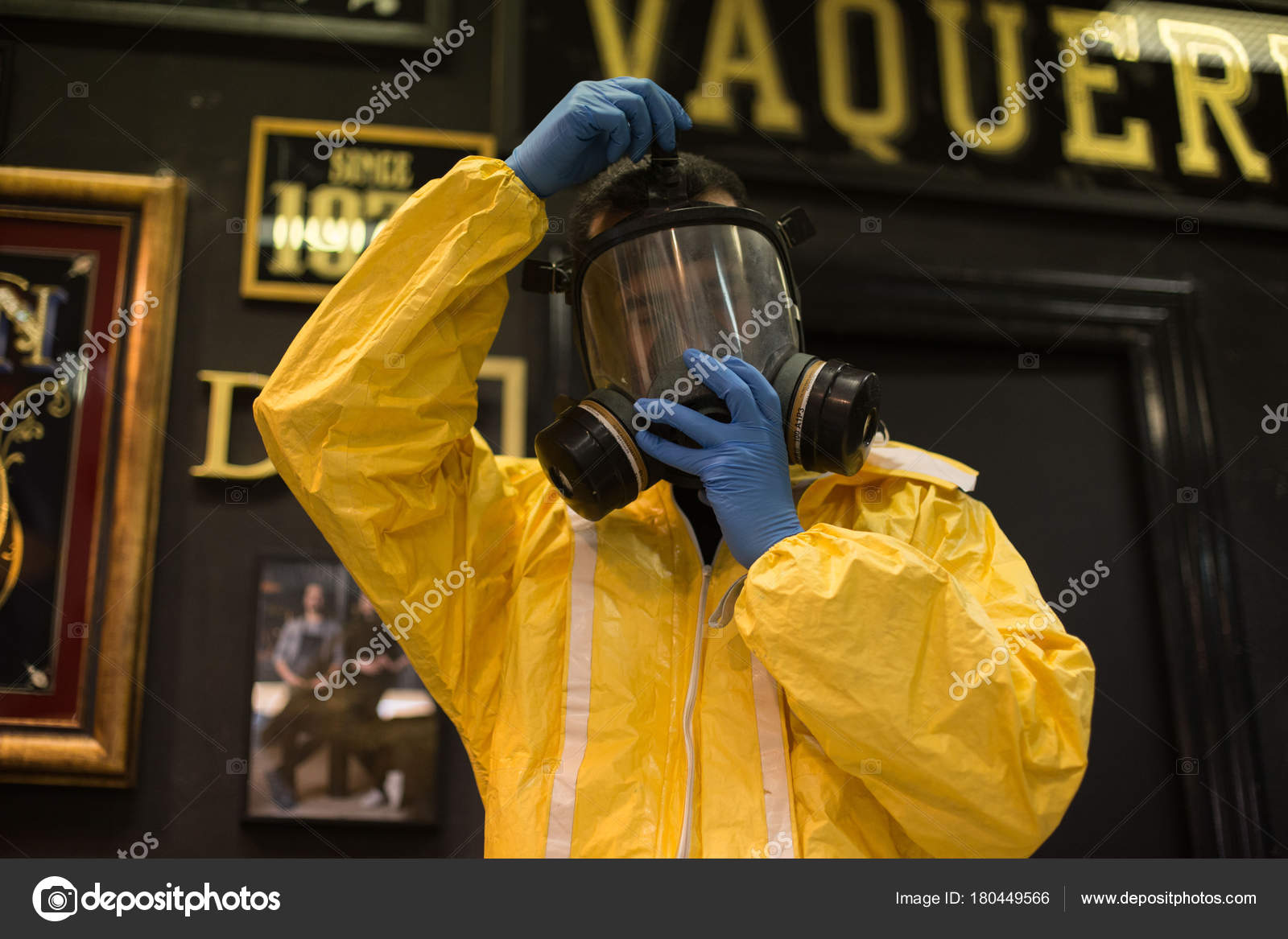 Man Wears Yellow Protective Suit Respirator Gas Mask Stock Photo by