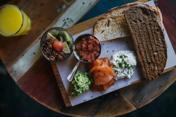 Crunchy Toast Avocado Spread Tomato Fresh Salmon Cheese Served Wooden — Stock Photo, Image