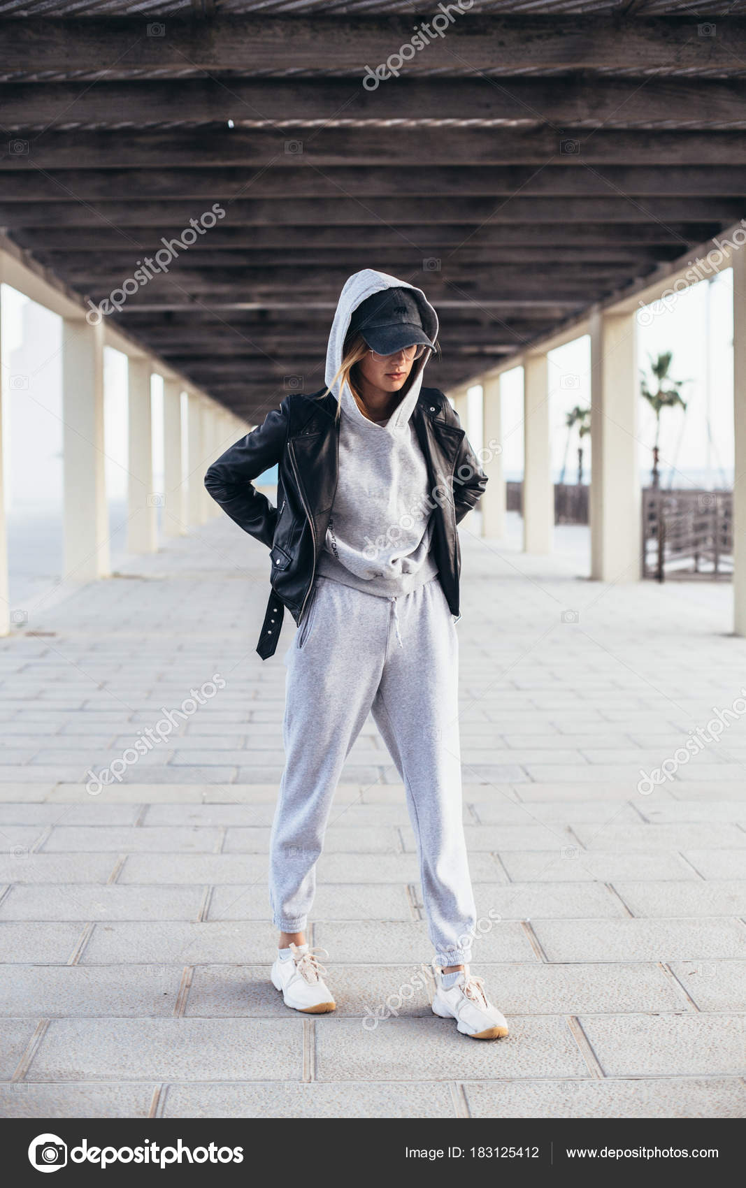 girl in sweatpants and hoodie