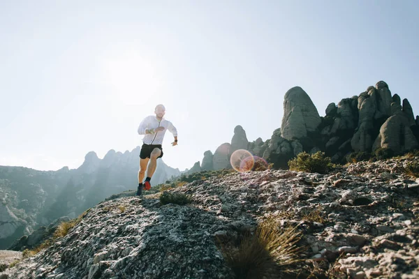 Man Shorts Wind Jacket Runs Rock Cliff Mountain Path Ultra — Stock Photo, Image