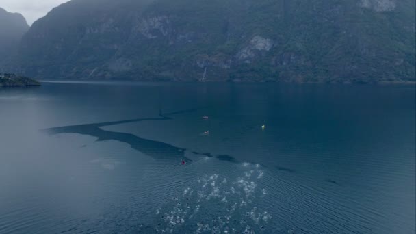Aerial drone shot of triathlon in norway fjord — Stock Video