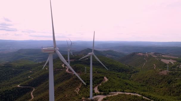 Wind turbine farm on mountain landscape at sunset — 비디오