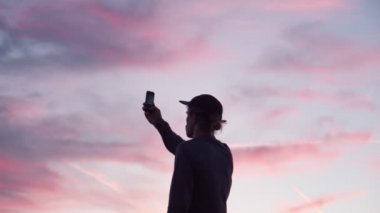 Hipster or millennial film sunset at rooftop