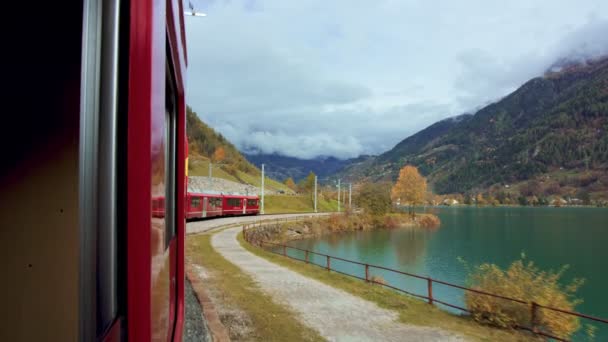 View from train window on mountain landscape — Stock Video