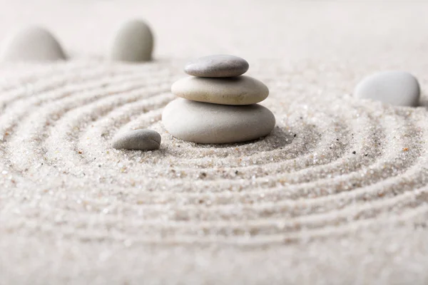 Japanese zen garden meditation for concentration and relaxation sand for harmony and balance in pure simplicity - macro lens shot