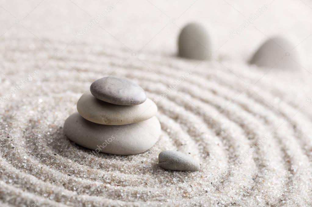 Japanese zen garden meditation for concentration and relaxation sand for harmony and balance in pure simplicity - macro lens shot