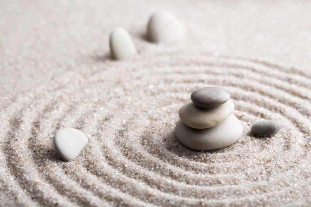 Japanese zen garden meditation for concentration and relaxation sand for harmony and balance in pure simplicity - macro lens shot