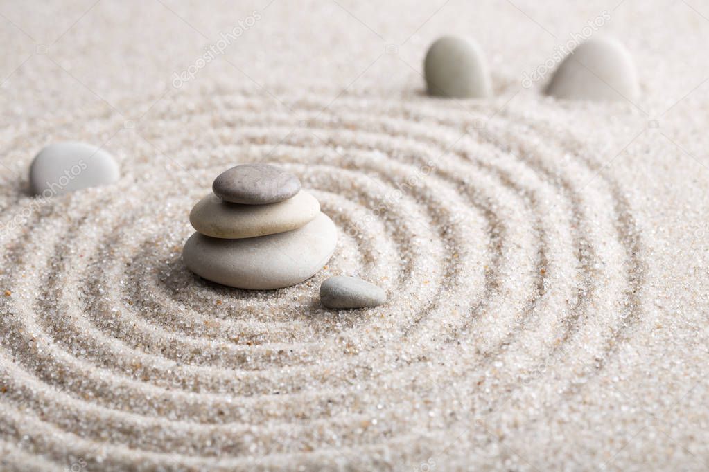 Japanese zen garden meditation for concentration and relaxation sand for harmony and balance in pure simplicity - macro lens shot