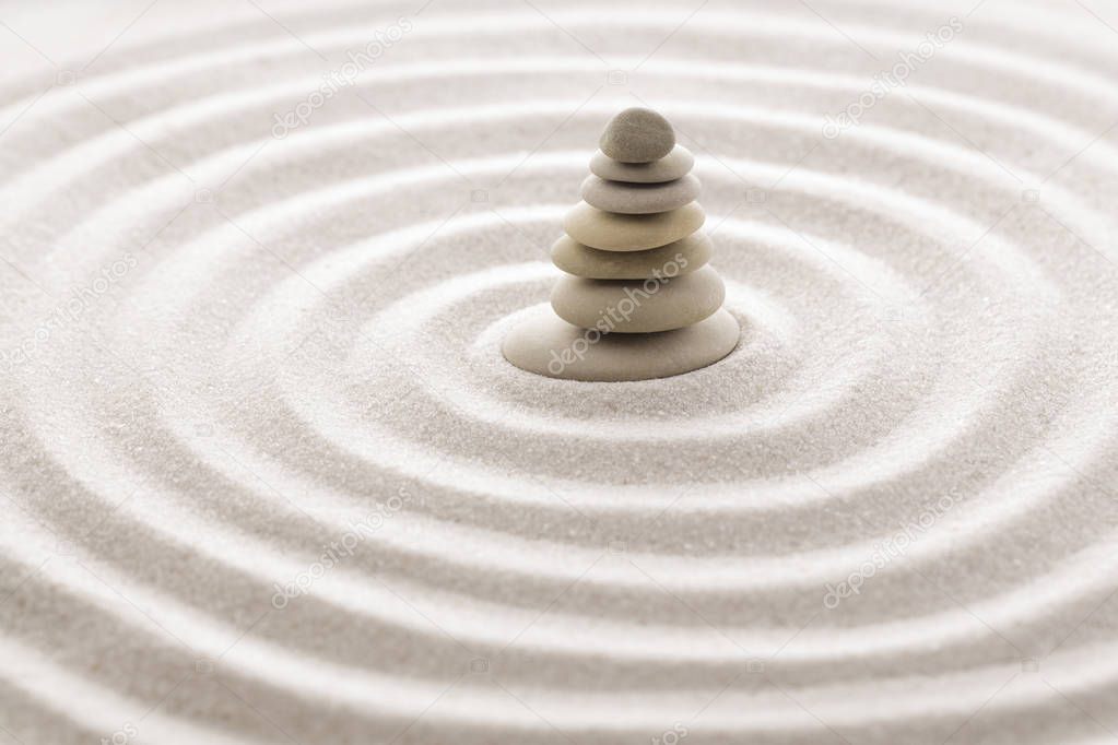 Japanese zen garden meditation for concentration and relaxation sand for harmony and balance in pure simplicity - macro lens shot