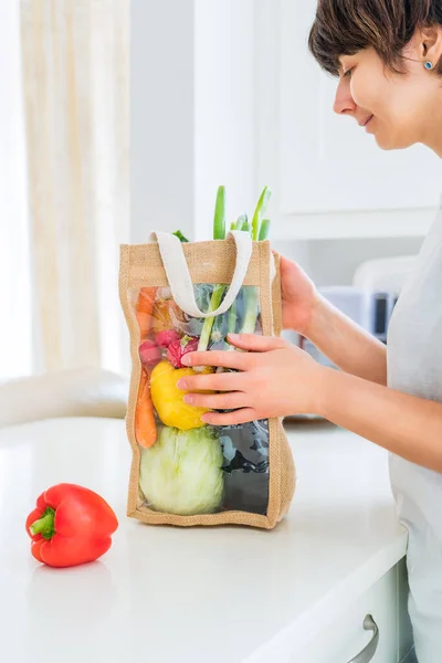 Woman Holding Reusable Eco Sackcloth Fabric Bag Packaging Fresh Organic — Stock Photo, Image