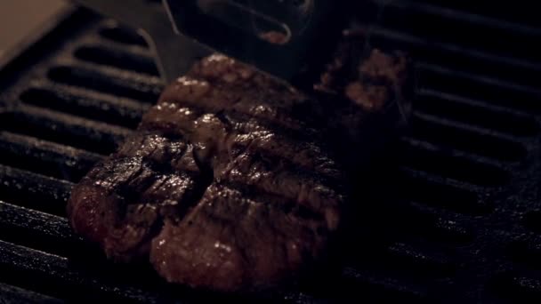 Cooking meat in slow motion — Stock Video