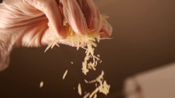 Topping cheese in slow motion — Stock Video