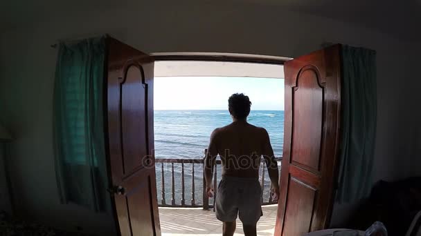 Man Going Out Sea View From a Balcony — Stock Video