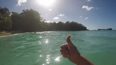 Başparmak Over güzel tropikal kumsal gösterilen