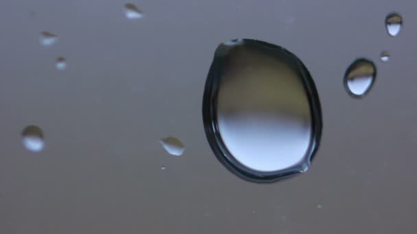 Drops on the Window Glass Extreme Close up — Stock Video