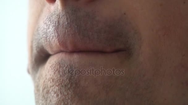 Man Biting and Licking Lips Close up — Stock Video