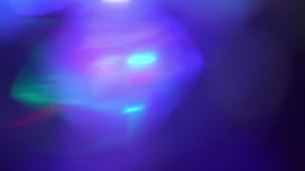 Universum, Raum, Galaxie, Farbe blau Indigo Bewegungshintergrund rotierende Fackeln und Bokeh-Lichter — Stockvideo