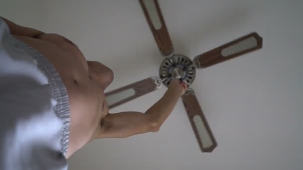 Man Turns On Ceiling Electric Fan In The Room Save Himself From