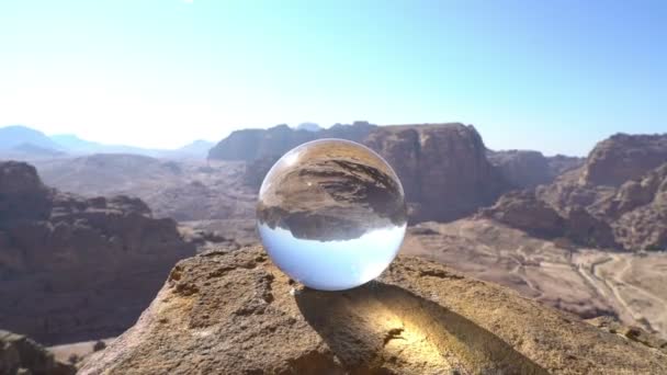 Crystal ball on beautiful background of wonderful mountain landscape, petra jordan — Stock Video