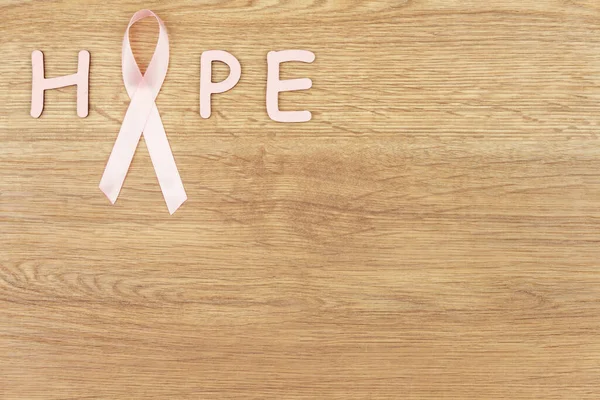 Conceito Doença Oncológica Palavra Esperança Escrito Com Uma Fita Rosa — Fotografia de Stock