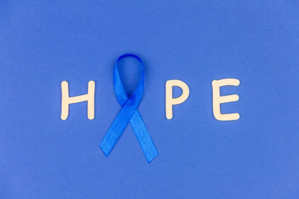 Concept Maladie Oncologique Mot Espoir Écrit Avec Ruban Bleu Comme — Photo