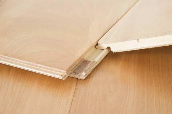Wooden laminate flooring boards — Stock Photo, Image