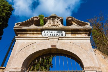 Rome, ITALY, OCTOBER 17, 2015 - The entrance of Catacomb of Callixtus, one of the biggest and famous catacombs complex of Rome, along the old Appian Way clipart