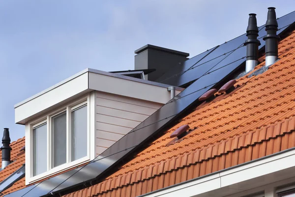 Dormer and solar panels — Stock Photo, Image