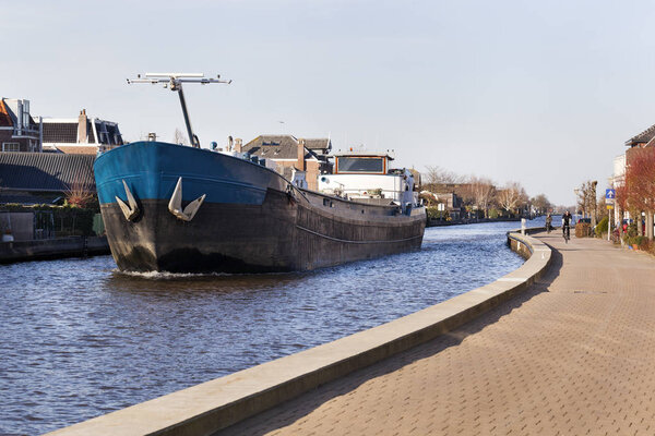 Barge on the river Gouwe in the Netherlands