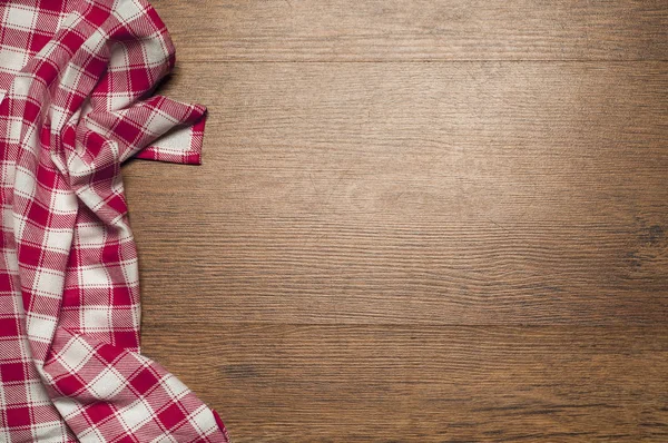 ahşap kahverengi tahıl doku, koyu ahşap duvar arka plan, ahşap masa, kırmızı Tekstil, damalı peçete Üstten Görünüm