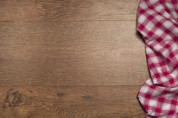 ahşap kahverengi tahıl doku, koyu ahşap duvar arka plan, ahşap masa, kırmızı Tekstil, damalı peçete Üstten Görünüm