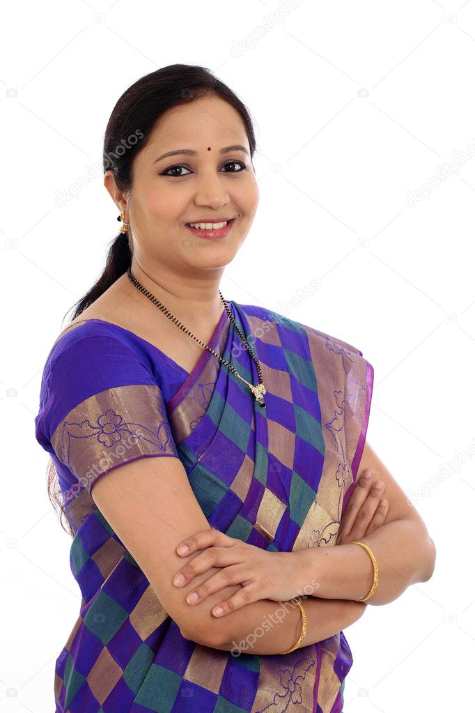 Traditional Indian woman with arms crossed against white background