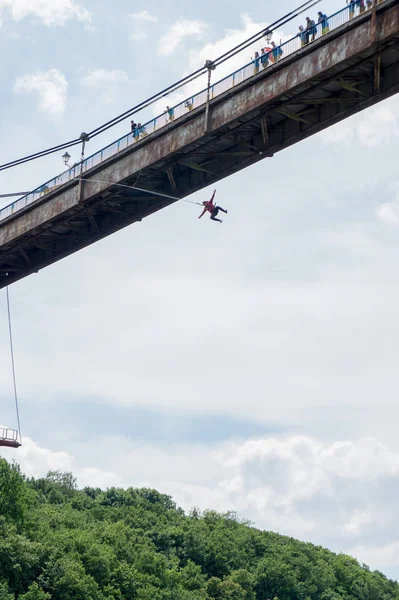 Zhytomyr, Ukraine - May 30, 2015: Extreme jump from a 42 m high pedestrian bridge