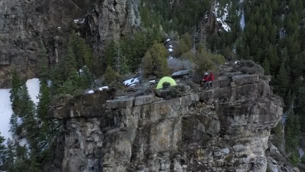 Flying Tent Top Cliff Looking Campsite While Passing Overhead Couple — Stock Video