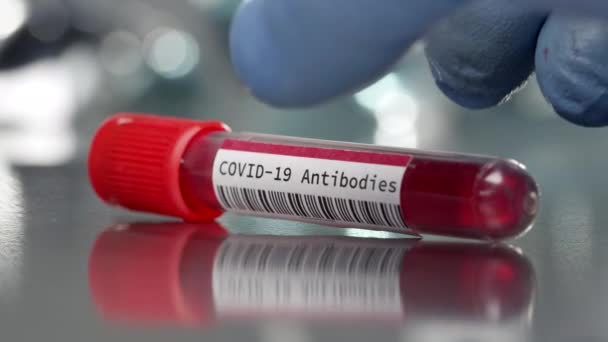 Vial Anticuerpos Contra Coronavirus Covid Laboratorio Médico Vista — Vídeo de stock