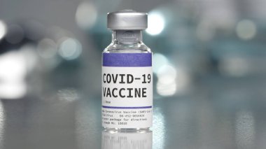 Covid-19 Coronavirus aşı şişesi tıbbi laboratuarda.