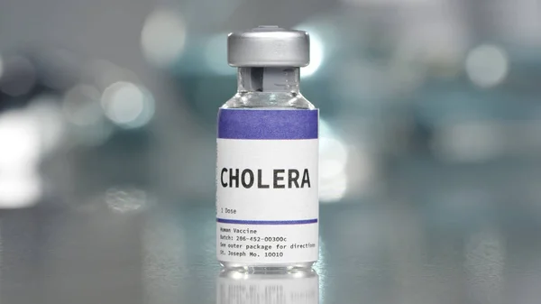 Orta laboratuarda kolera aşısı şişesi.