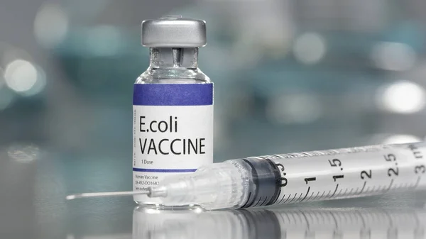 Medial laboratuarda şırıngalı E.coli aşı şişesi.