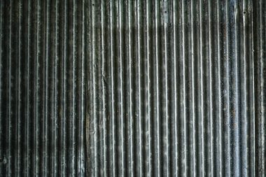 Eski paslı çinko kaplama duvar dokusu arkaplanı.