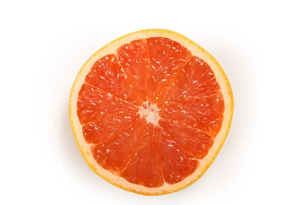 Släppandet av en grapefrukt segment — Stockfoto
