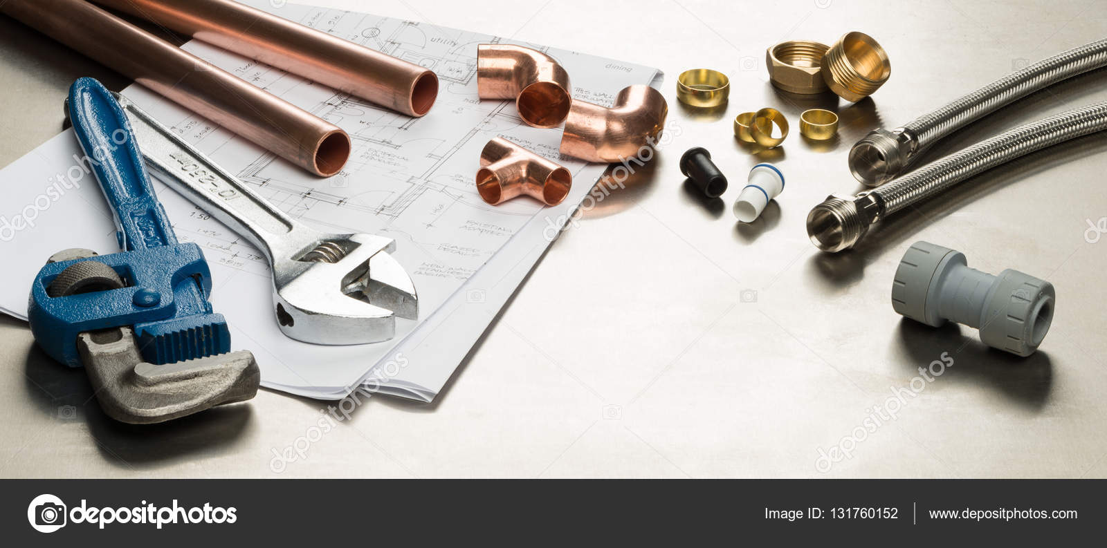 Selection of Plumbers Tools and Plumbing Materials Stock Photo by