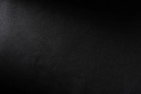 Close Section Black Leather Swatch Showing Grain Shaft Light — Stock Photo, Image