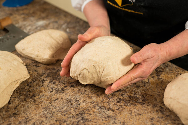 Fresh pastry dough kneaded to a ball