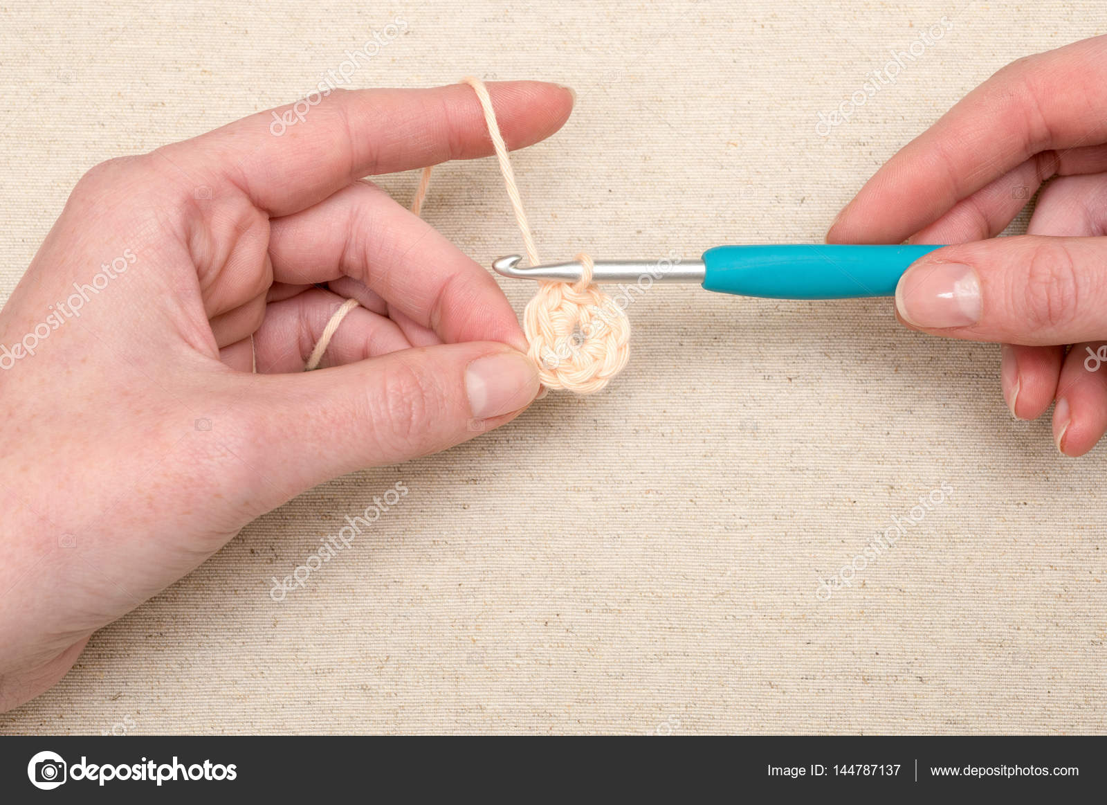Crocheting Stitching Circular Pattern with Knitting Hook Stock Photo by  ©stock@photographyfirm.co.uk 144787137