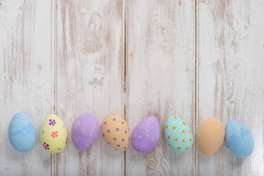 Pastel renkli yumurta kopya alanı boyalı afiş fotoğraf