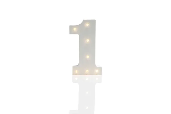 Dekorative Nummer 1 mit eingebetteten LED-Leuchten über weißem Hintergrund — Stockfoto
