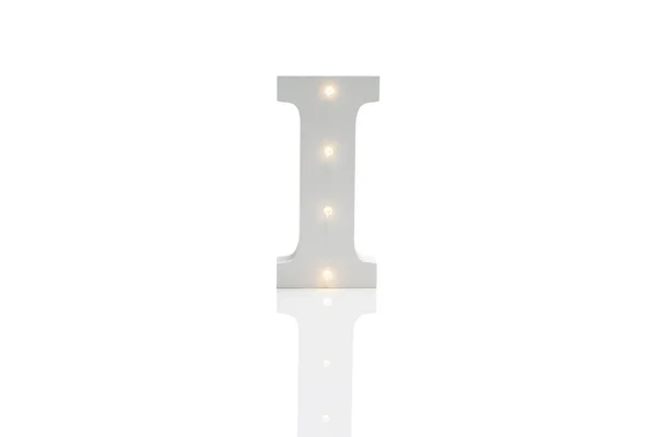 Dekorativer Buchstabe i mit eingebetteten LED-Lichtern über weißem Hintergrund — Stockfoto