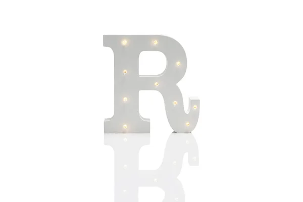 Carta decorativa R com luzes LED incorporadas sobre Backgrou branco — Fotografia de Stock