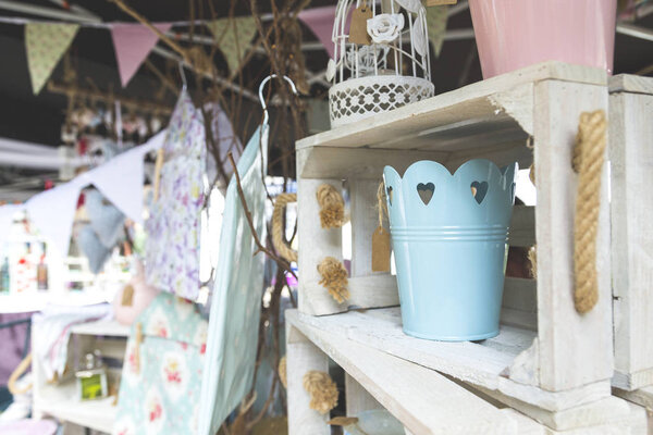 Decorative Pails and Bird Cage in Crate in Street Market